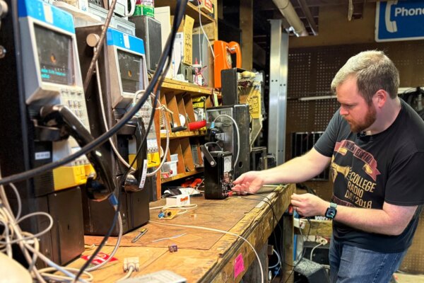The lateral hustle and bustle of this engineer? He relives payment phones to make free calls